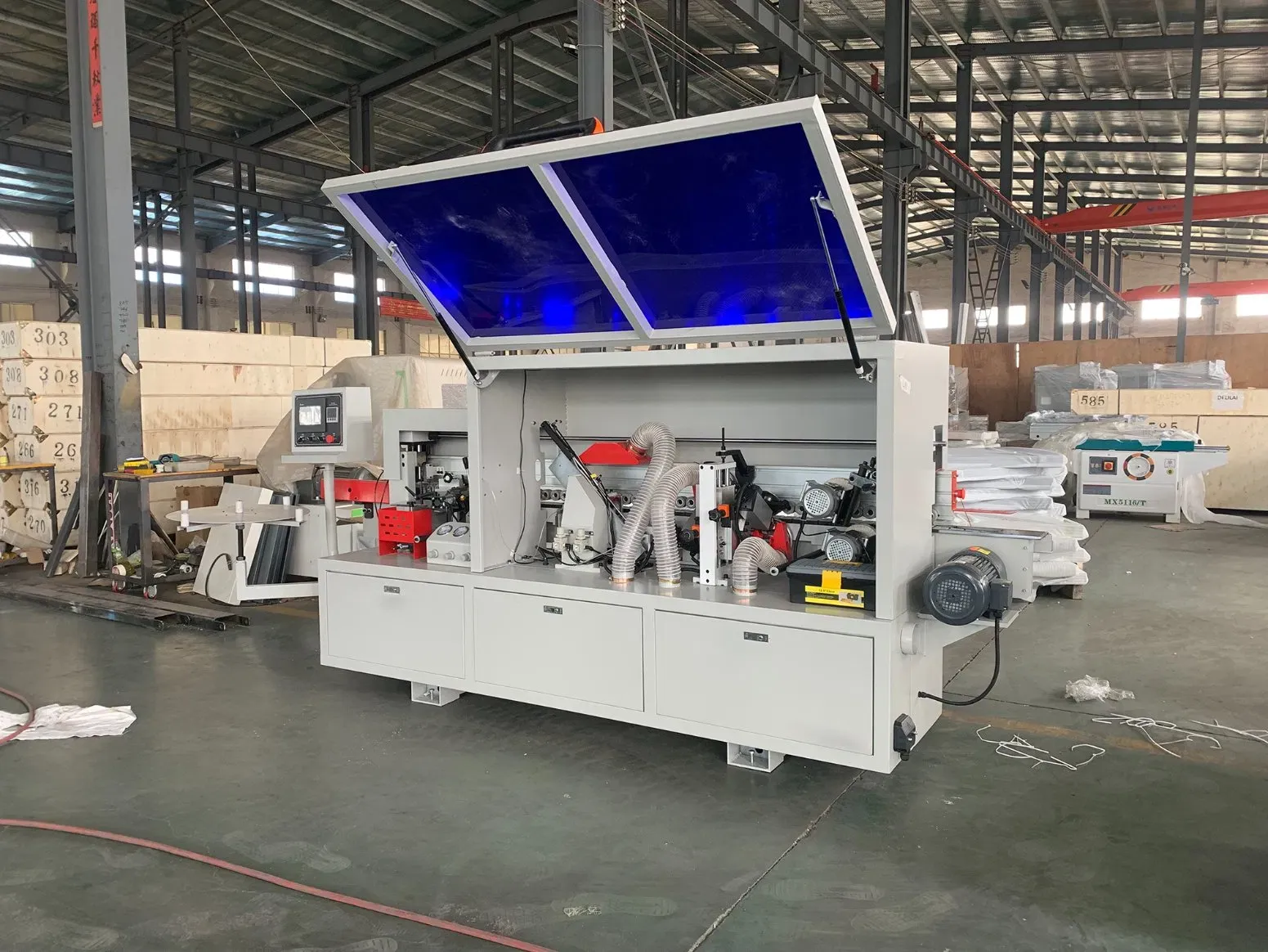 Автоматическая малогабаритная кромкооблицовочная машина для шкафов ZD400 3