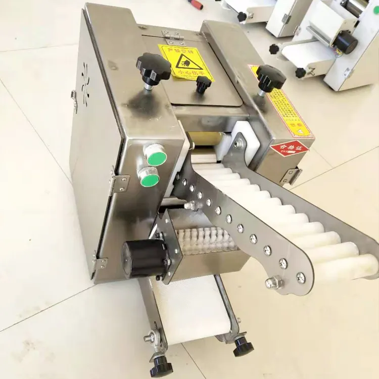 Автоматическая машина для изготовления оболочек для момо, эмпанада и пельменей 2