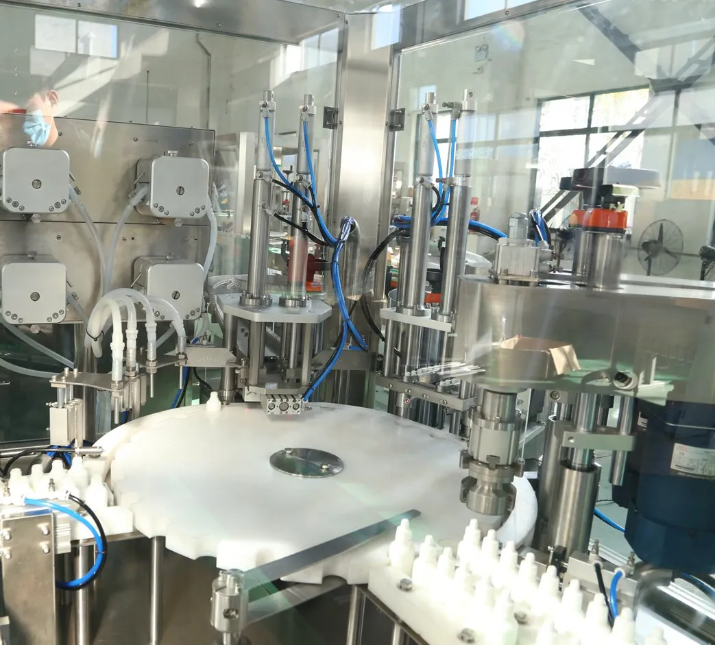 Автоматическая машина для заполнения, укупорки и маркировки бутылок различного объема 4